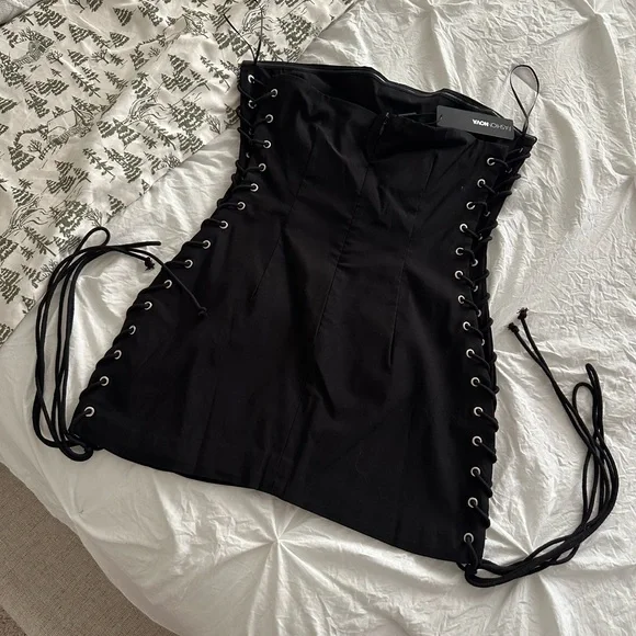 Fashion Nova black mini bodycon dress with corset sides. - Picture 2 of 5